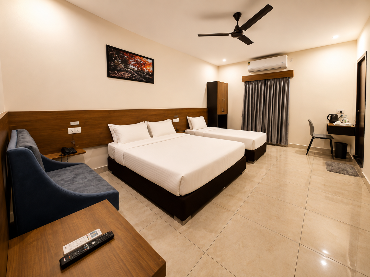 Family Suite with large bed and warm tones